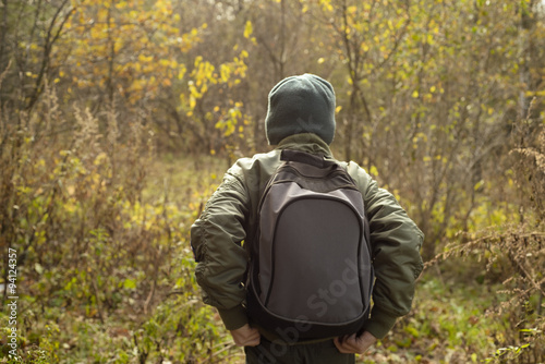 Boy-traveler with a backpack © Khatsko Tatyana