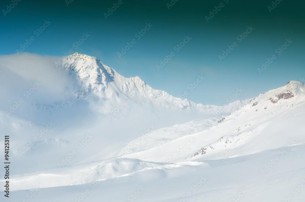 Winter landscape with snow-covered mountains