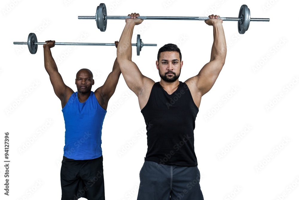 Naklejka premium Man lifting barbell with trainer