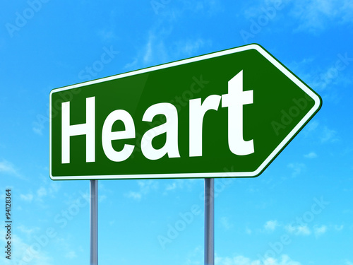 Medicine concept: Heart on road sign background