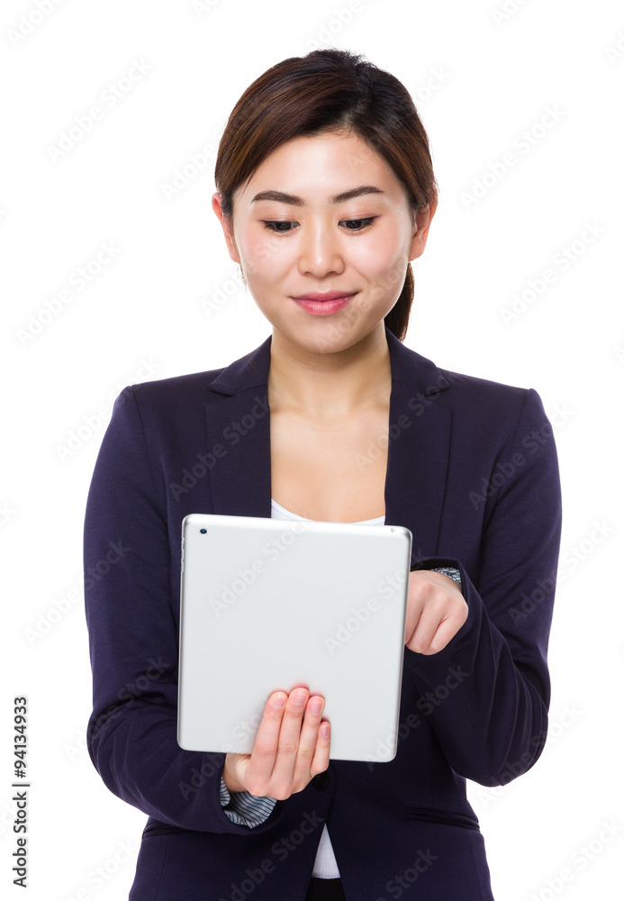 Young Businesswoman use of the tablet pc Young Businesswoman use of the tablet pc