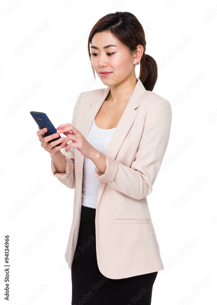 Young Businesswoman use of the cellphone Young Businesswoman use of the cellphone