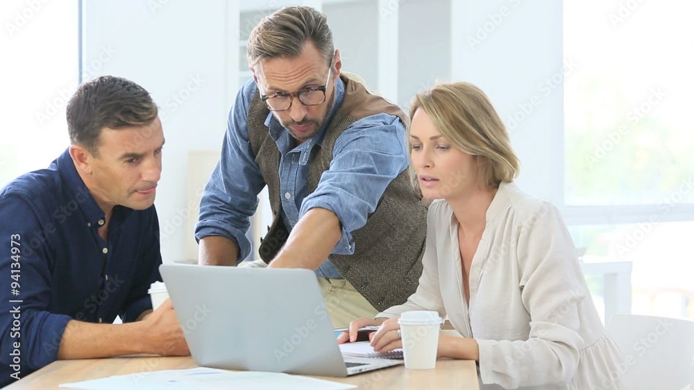 Financial department people working on budget plan Financial department people working on budget plan