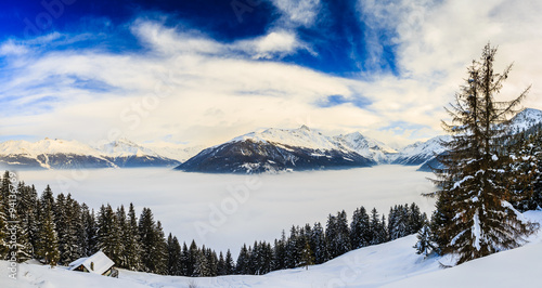 Winter landscape in Swiss Alps photo