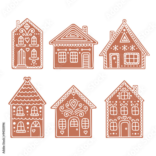 Gingerbread house. Set of vector hand drawn gingerbread houses. Christmas cookies. Brown and white colors.