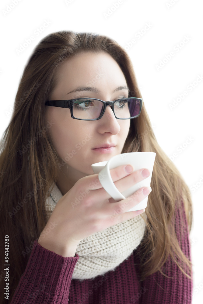 Pretty Girl with glasses holding a cup of tea isolated on a white background