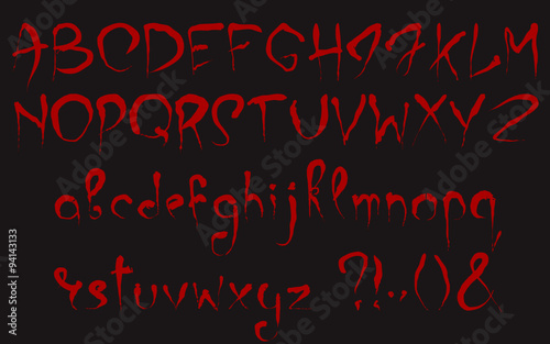 Bloody alphabet set. Uppercase and lowercase dark red stylized hand drawn letters and most important punctuation marks isolated on a black background.