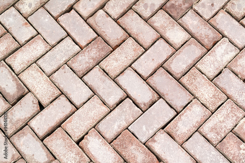 Close-up of brick paving on road or street, Netherlands