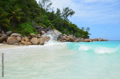 Beautiful Seychelles beach with wave crashing