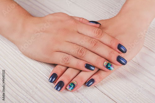 Dark blue nail art with print eye