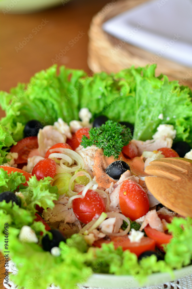 Mixed vegetable salad with chicken in the white bowl Mixed vegetable salad with chicken in the white bowl