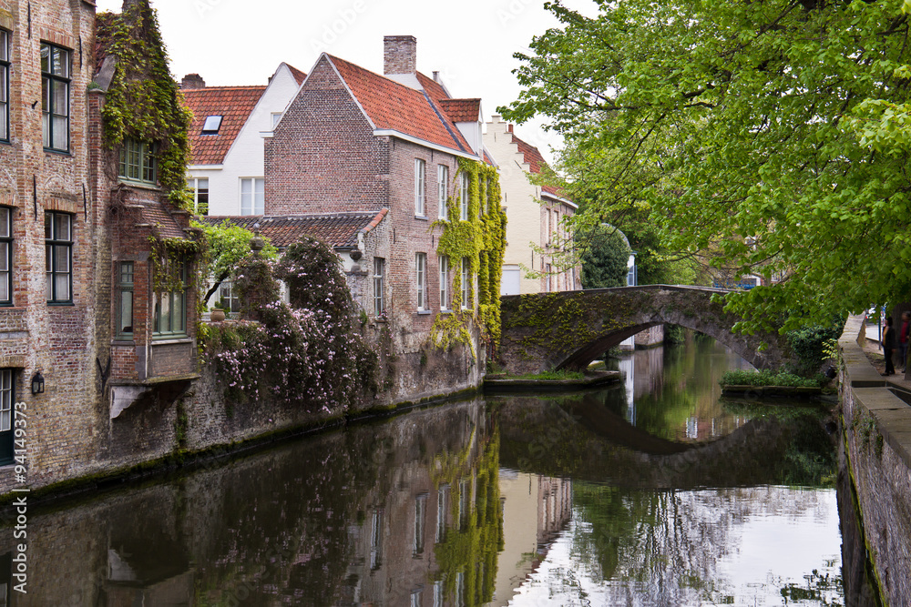 Canal with bridge in the European city of Bruges, Belgium