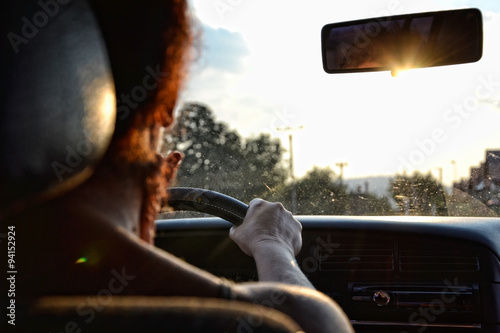 Wallpaper Mural Woman driving a car in the summer at sunset Torontodigital.ca