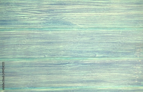 Greenish painted wooden wall