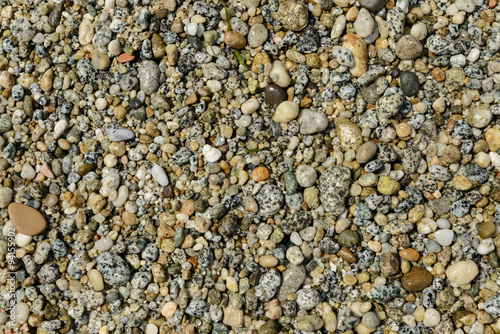Small pebbles abstract background.