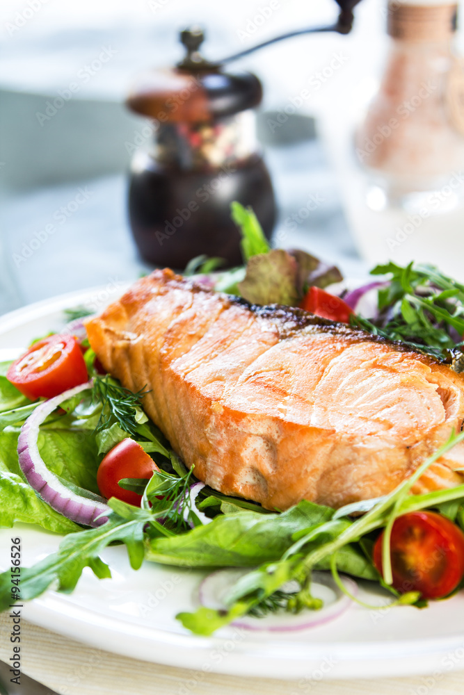 Salmon steak with salad Salmon steak with salad