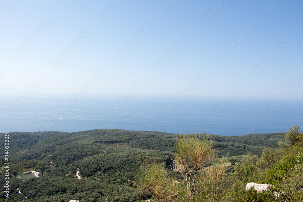 Seascape with blue sky and sea horizon.