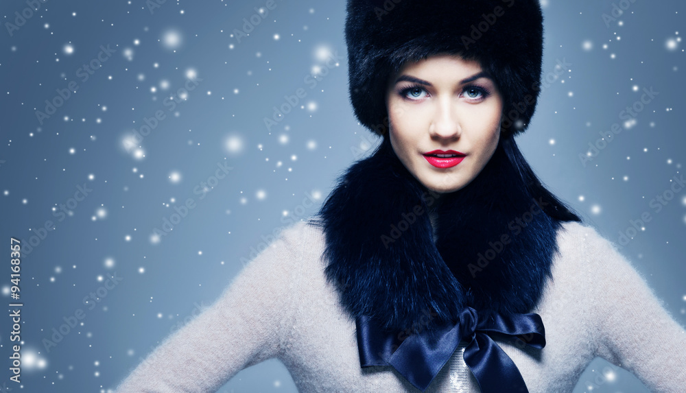 Fashion style portrait of a woman in an elegant winter fury clot Fashion style portrait of a woman in an elegant winter fury clot