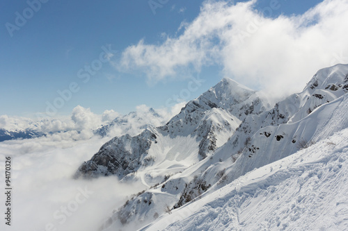 View on mountains and blue sky above clouds  Krasnaya Polyana