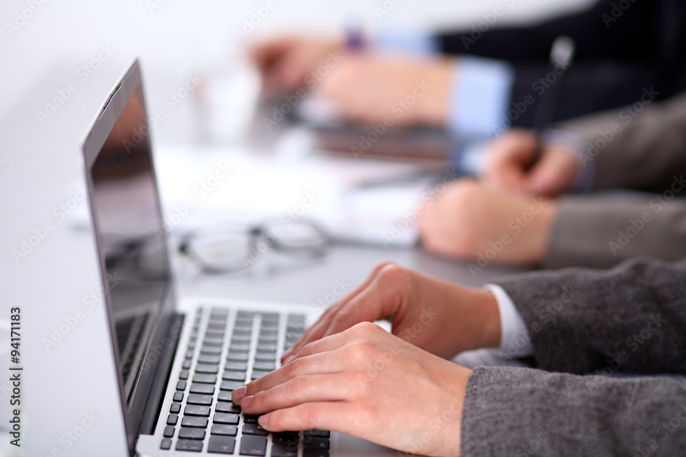 Group of business people working together in office Group of business people working together in office
