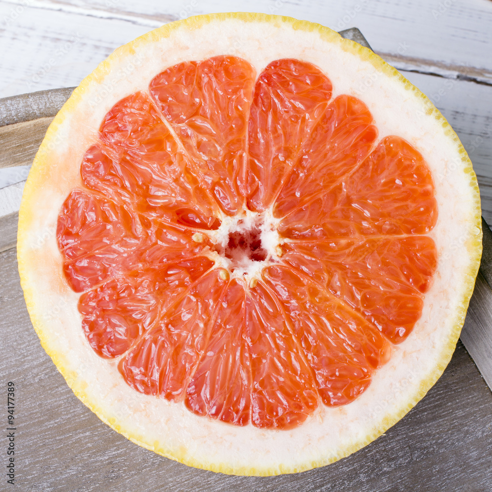 grapefruit on wooden background grapefruit on wooden background