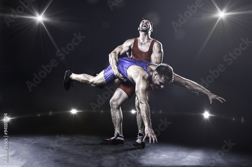 Freestyle wrestler throwing  © 27mistral