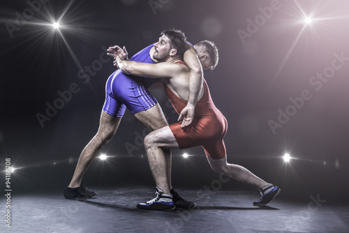 Freestyle wrestlers in action