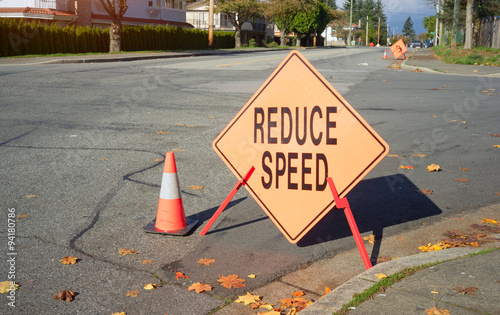 the image of reduce speed sign