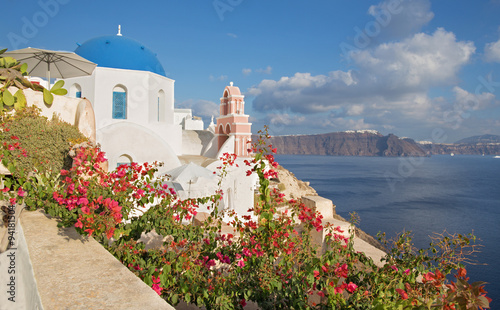 Santorini - The look across the flowers to typically church in O