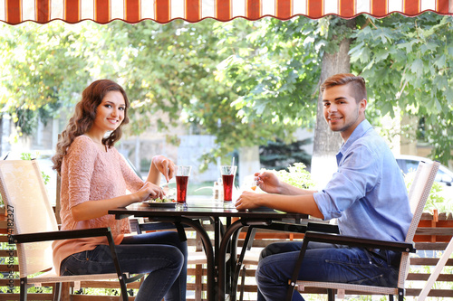 young couple having lunch o...