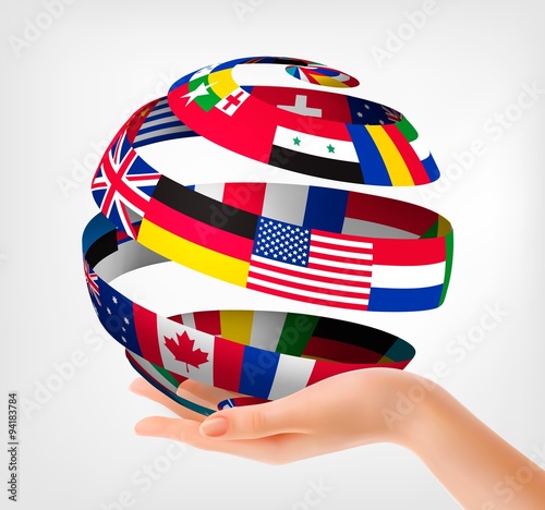 Flags of the world on a globe, held in hand. Vector illustration