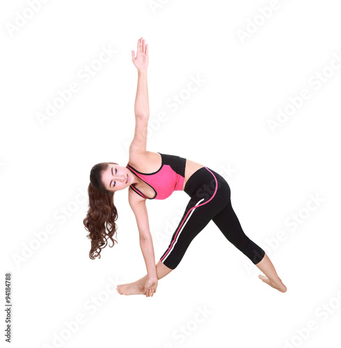 Young woman doing yoga exercise