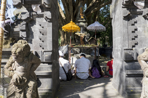 People praying at Tirta Empul holy water temple Bali ,Indonesia.