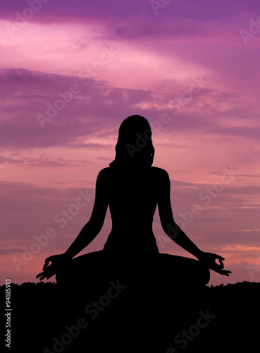 Fototapeta Naklejka Na Ścianę i Meble -  Silhouette of a beautiful Yoga woman