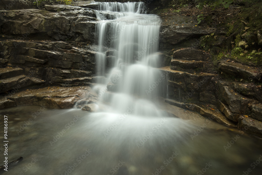 Obraz premium Silky water of Stairs Falls in Franconia Notch, New Hampshire.