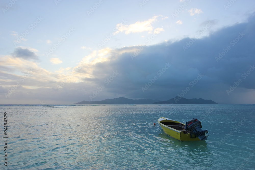 Sea and rain on islands with lonely boat