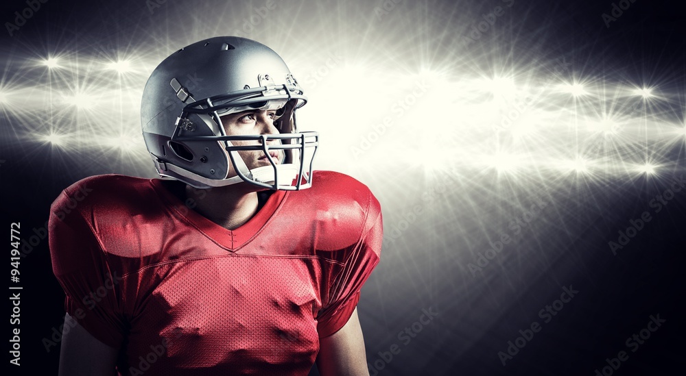 Composite image of american football player looking away Composite image of american football player looking away