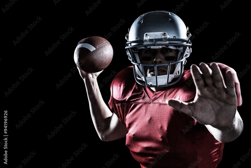 Composite image of sportsman throwing up the ball