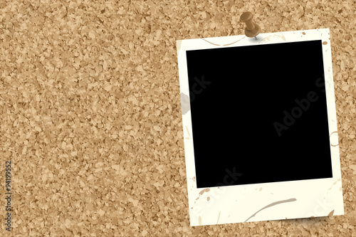 cork pinboard with old photo