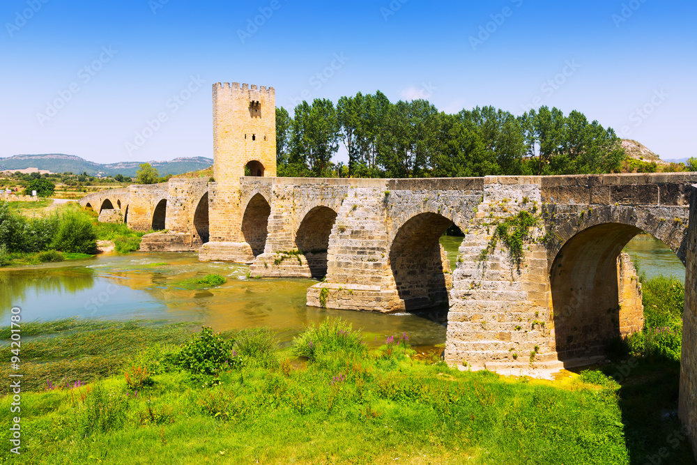 View of medieval stone bridge over Ebro near Frias