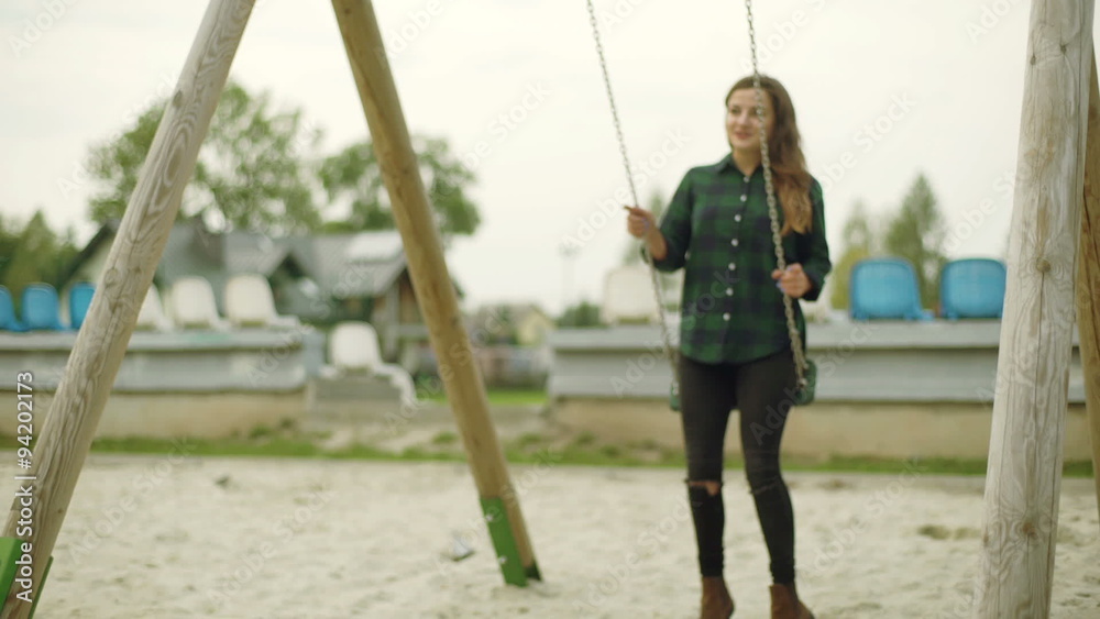 Girl start swinging on the seesaw and enjoying it
Girl start swinging on the seesaw and enjoying it