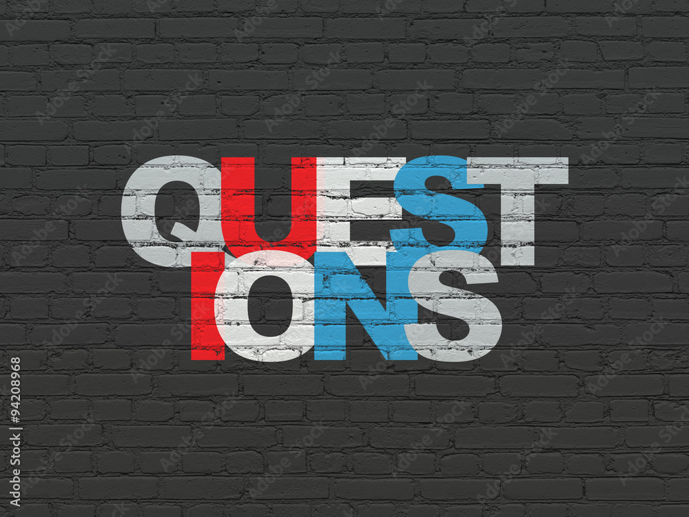 Learning concept: Questions? on wall background Learning concept: Questions? on wall background