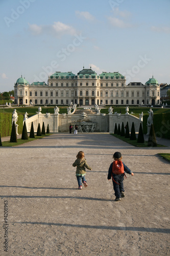 Photography VIENNA, AUSTRIA - APRIL 22, 2010: Running children in Belvedere Palace Gardens i