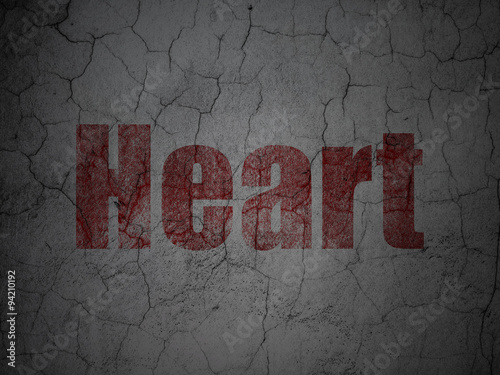 Health concept: Heart on grunge wall background