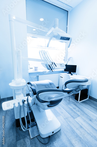 Dentist's office. Dental equipment, modern, clean interior. Blue tone