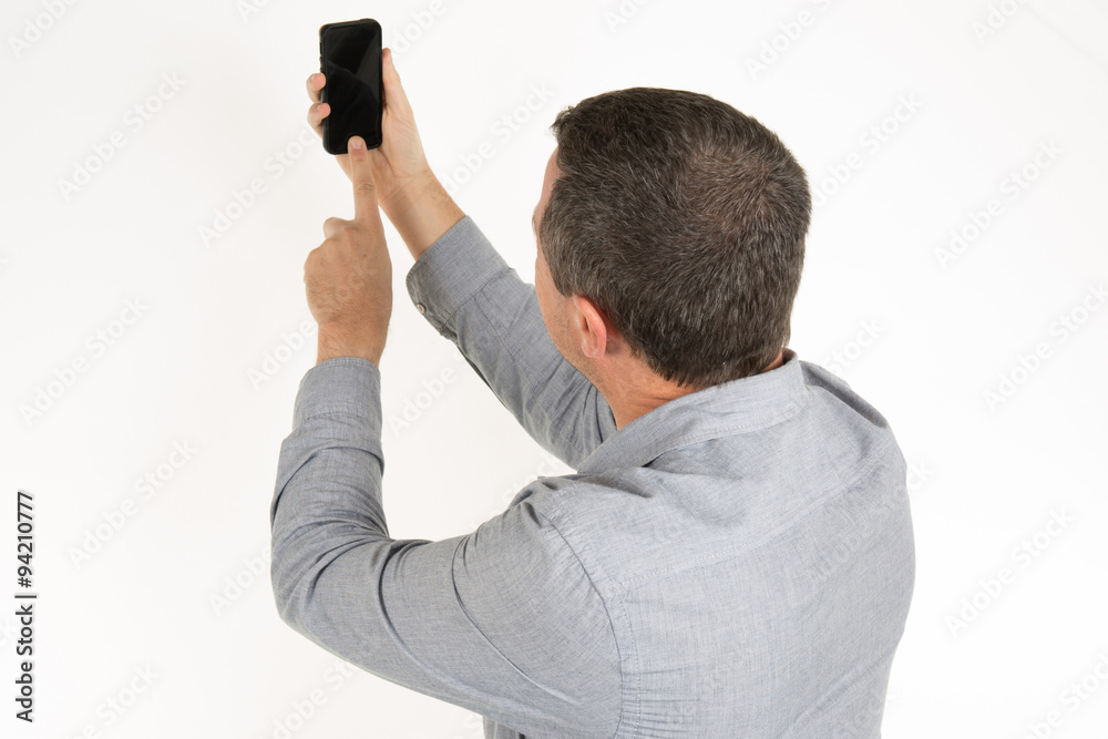 Modern man doing a self-portrait on the phone Modern man doing a self-portrait on the phone