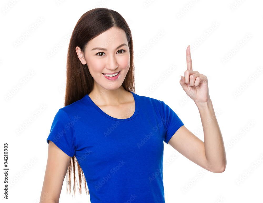Asian Young Woman showing finger point up Asian Young Woman showing finger point up
