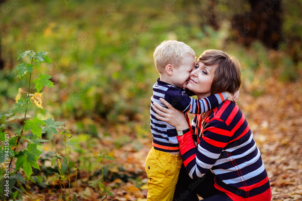 Fototapeta premium Mother and son communicate, park
