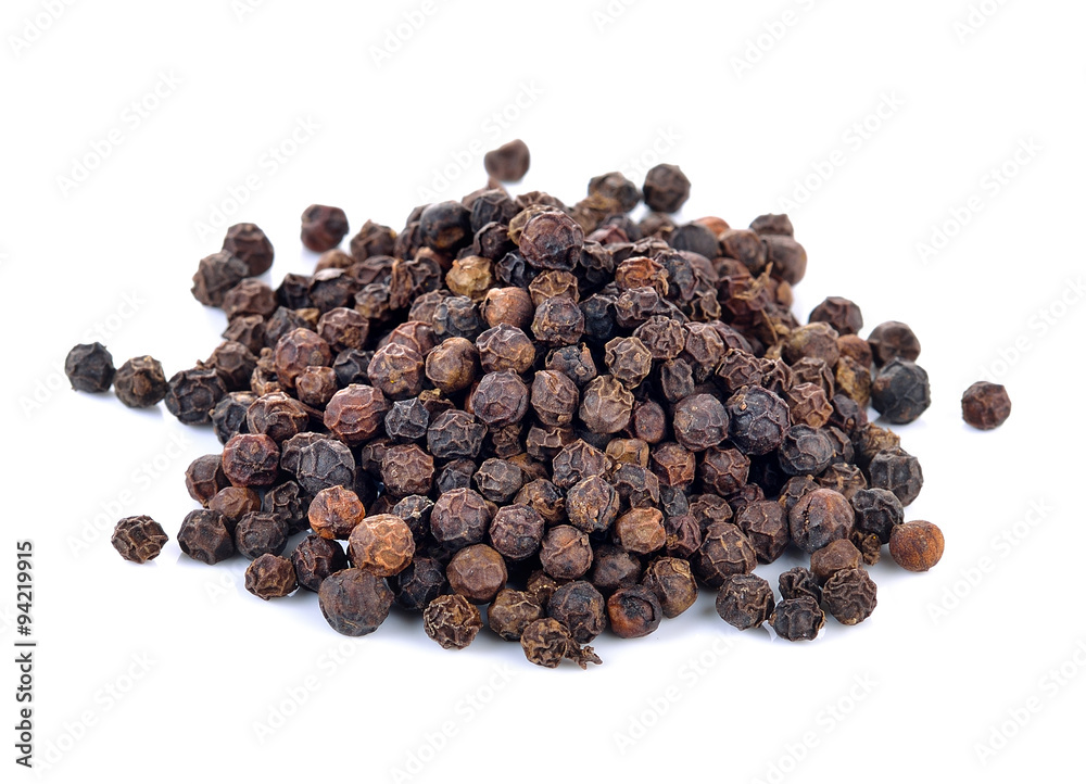 black peppers on the white background black peppers on the white background