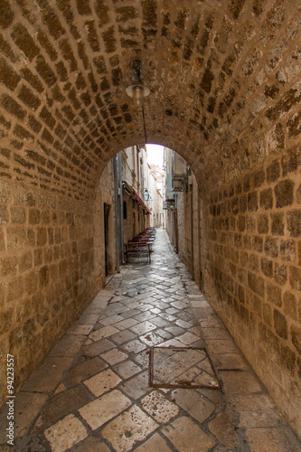 Narrow street and tunnel in the Old Town in Dubrovnik, Croatia 